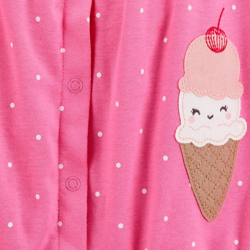 104893438-Romper-rosado-con-estampado-para-bebe-niña