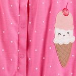 104893438-Romper-rosado-con-estampado-para-bebe-niña