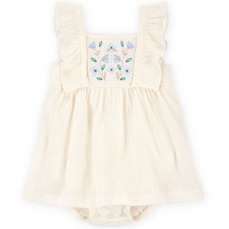 104893535-Vestido-beige-con-bordado-para-bebe-niña