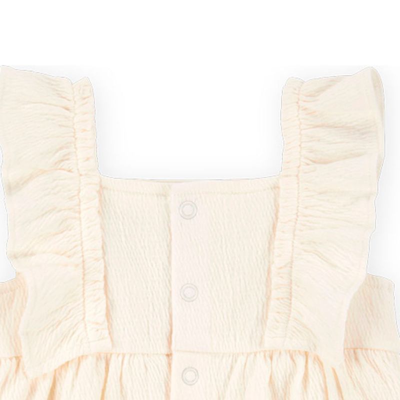 104893535-Vestido-beige-con-bordado-para-bebe-niña