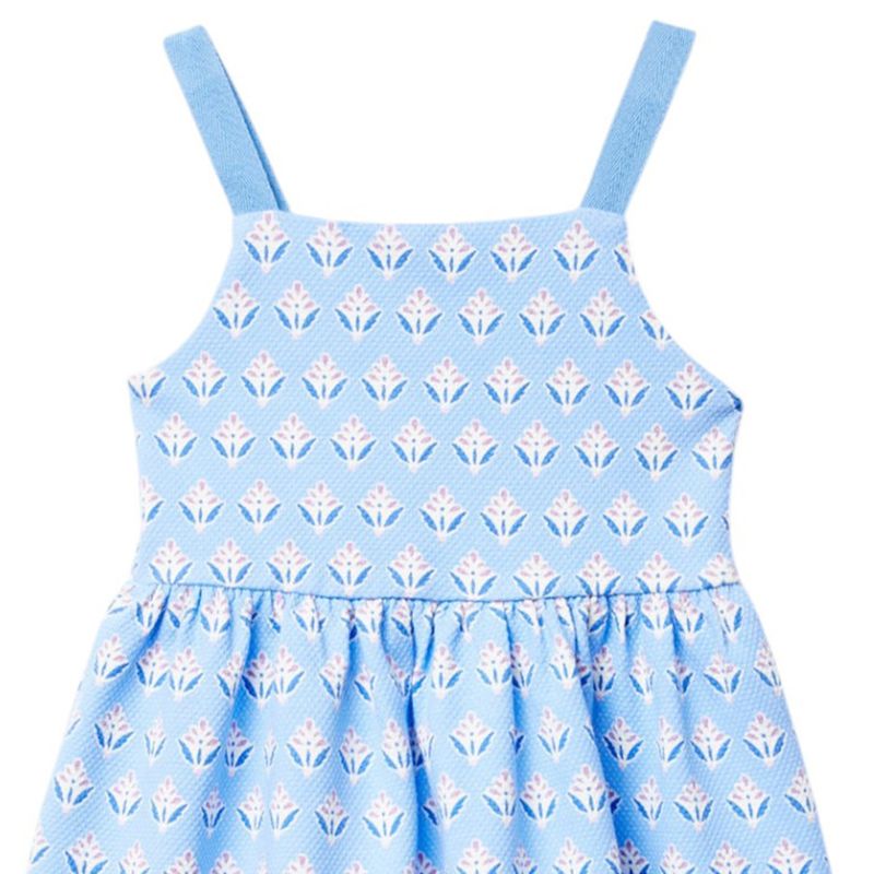 104897422-Vestido-celeste-con-estampado-para-niña