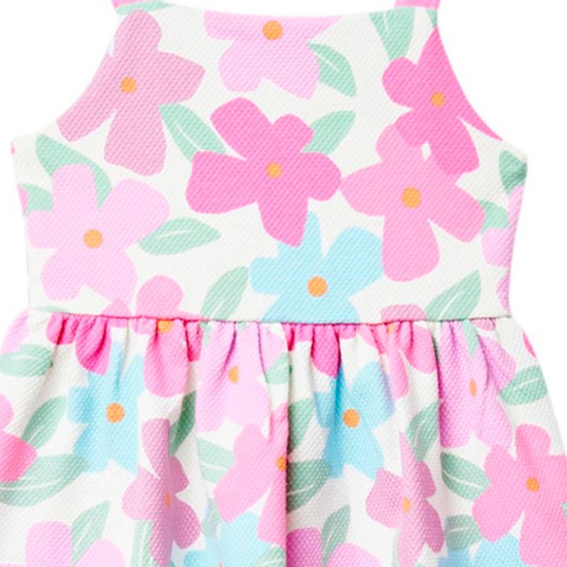 104897434-Vestido-blanco-con-estampado-para-niña