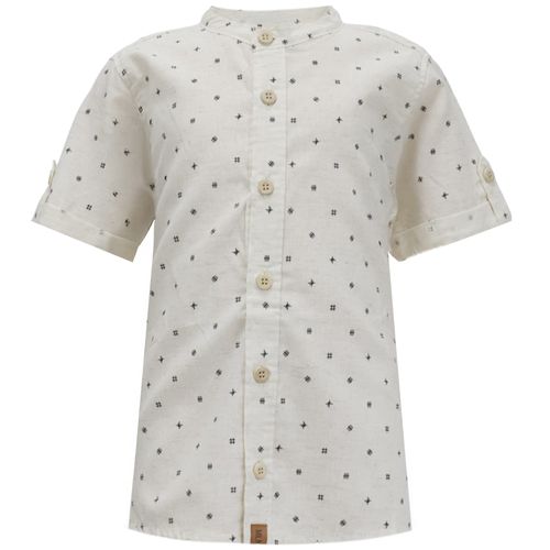 Camisa amarilla con estampado para niño