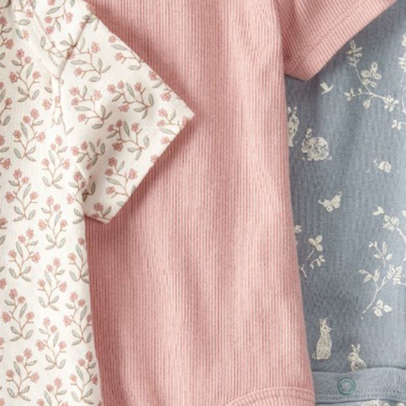 104893215-Set-de-3-mamelucos-multicolor-con-estampado-para-bebe-niña