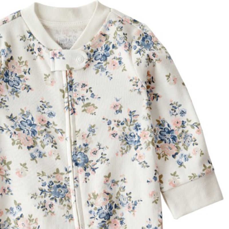 104893260-Pijama-blanca-con-estampado-para-bebe-niña