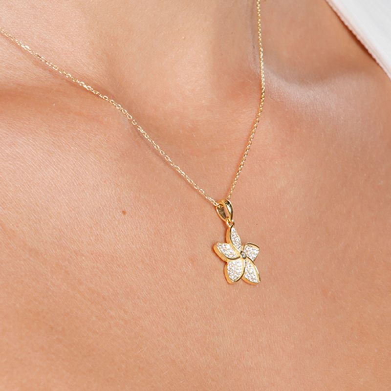 104890143---Set-de-aretes-y-cadena-con-dije-de-plata-con-baño-de-oro-para-mujer