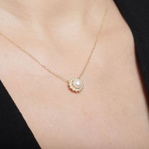 Cadena de plata con dije de perla en baño de oro para mujer