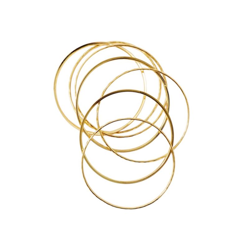 104917831-Set-de-pulseras-doradas-para-mujer