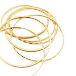 104917831-Set-de-pulseras-doradas-para-mujer