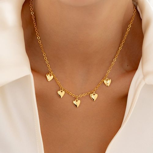 Set de collar y aretes de corazón dorado para mujer