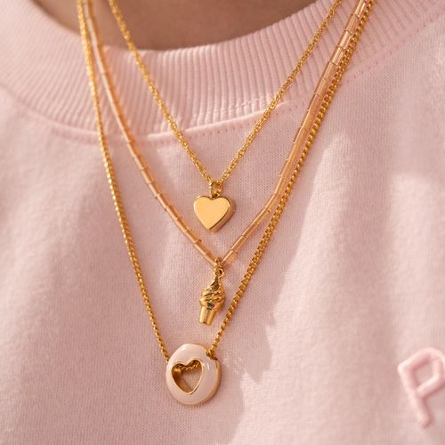 Set de collares y aretes con baño de oro para mujer