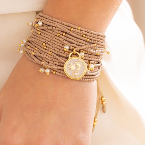 Set de 2 pulsera multitiras y aretes para mujer