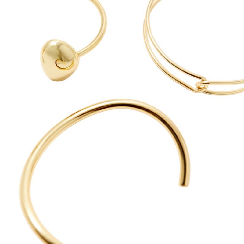 104917747---Set-de-3-brazaletes-metalicos-dorados-para-mujer