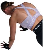 104928590-Top-deportivo-Nike-Pro-lila-para-mujer