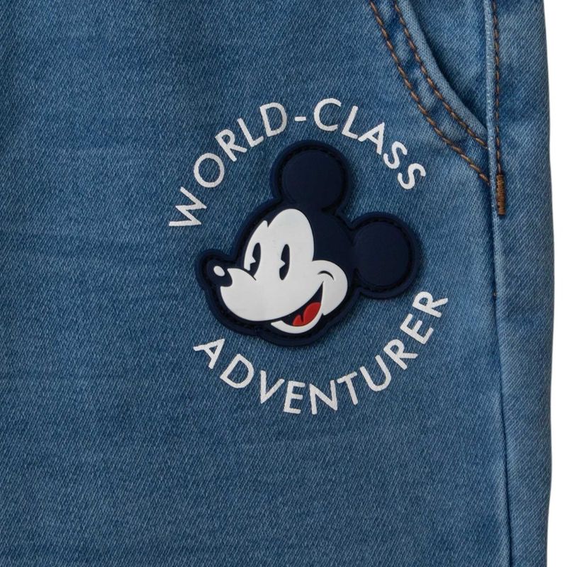 104932415-Pantalon-azul-lavado-con-bordado-de-Mickey-Mouse-para-niño
