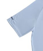 104891189-Camiseta-deportiva-running-Umbro-celeste-estampada-para-hombre