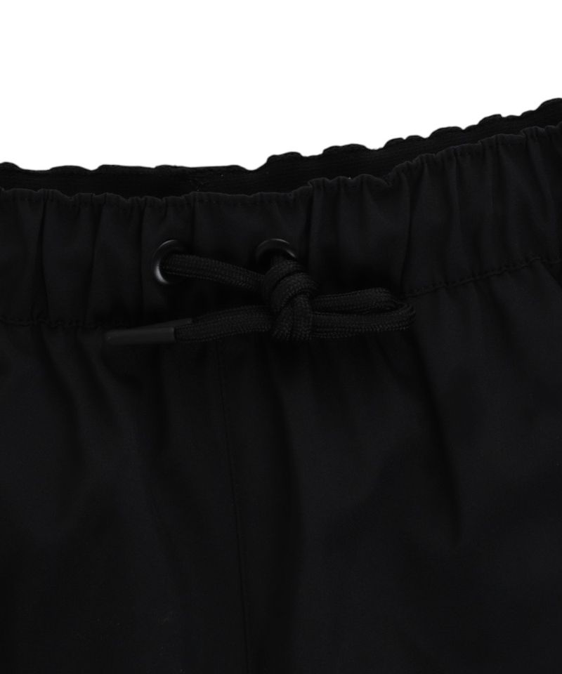 104862116-Short-deportivo-Umbro-negro-solido-para-hombre