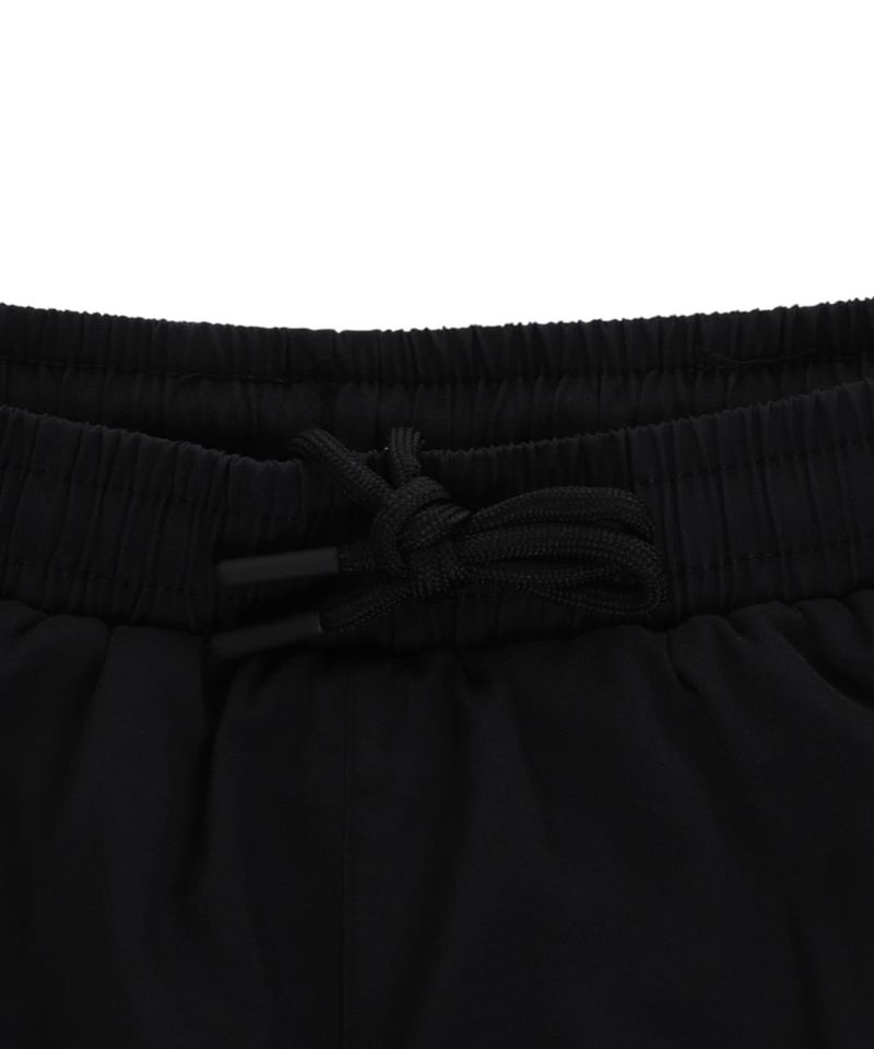 104862124-Short-deportivo-Umbro-negro-solido-para-hombre