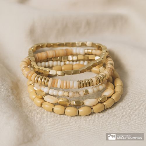 Set de pulseras elásticas en tonos nude y dorado para mujer