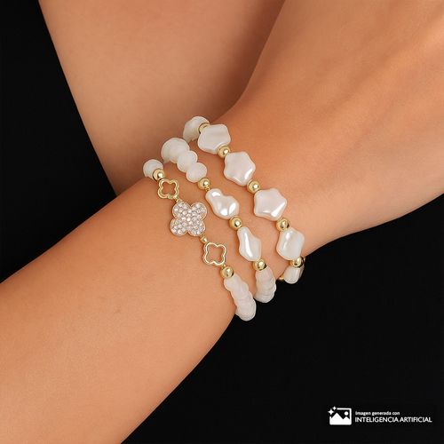 Set de Pulseras elásticas blancas con dorados para mujer