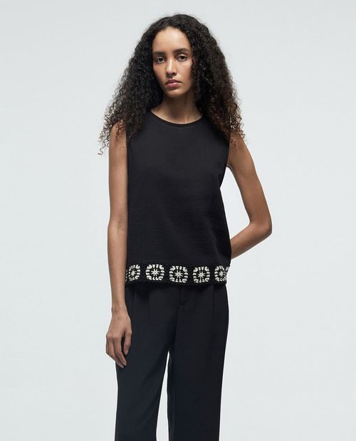 Blusa Sfera casual negra sin mangas para mujer