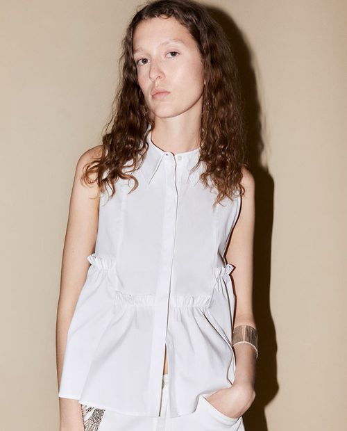 Blusa Sfera casual bicolor sin mangas para mujer