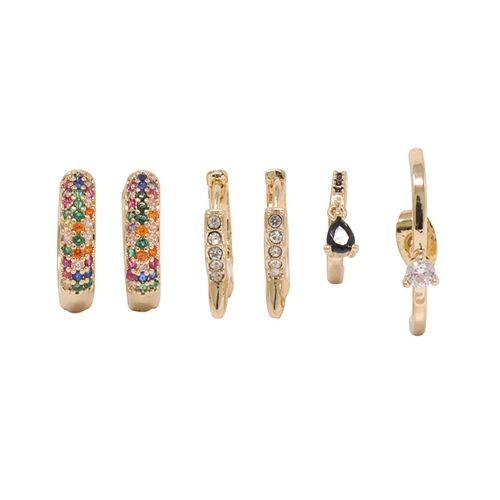 Set de 4 aretes dorado para mujer