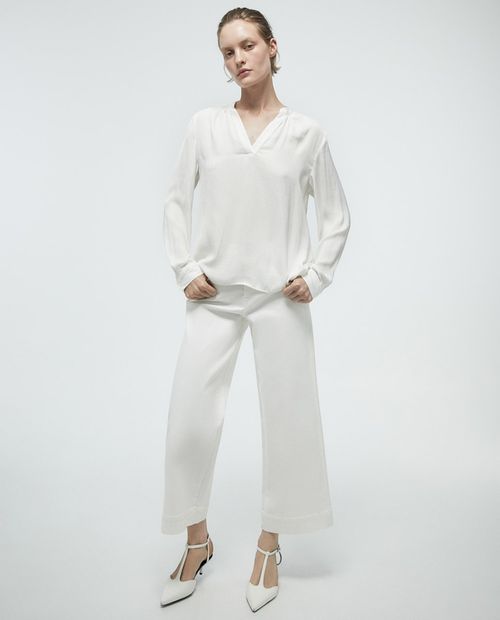 Blusa Sfera casual blanca de manga larga para mujer