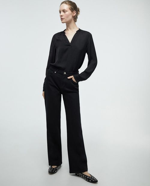 Blusa Sfera casual negra de manga larga para mujer