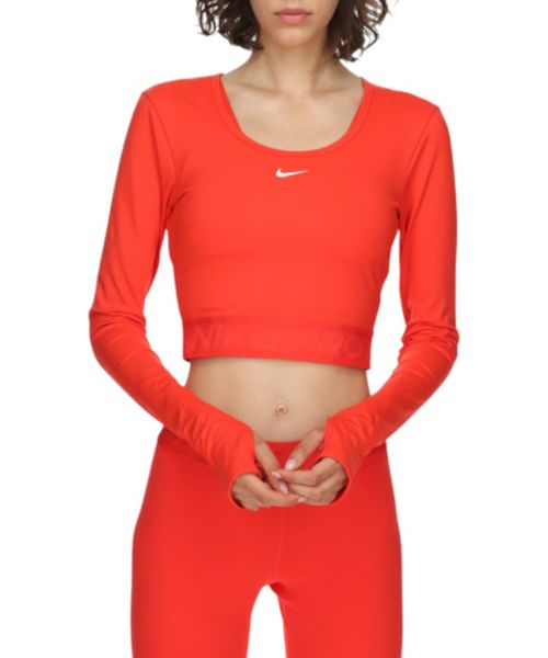 Camiseta deportiva crop top Nike Dri fit roja sólida para mujer