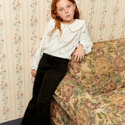 Jeans flare negro denim para niña