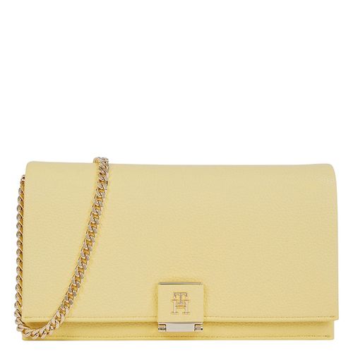 Cartera clutch Tommy Hilfiger color amarillo para mujer