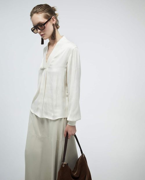 Blusa Sfera casual blanca de mangas largas para mujer