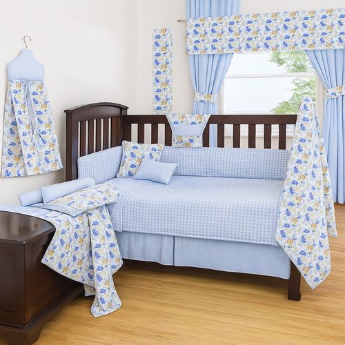 Set de 5 piezas ropa de cuna celeste con estampado