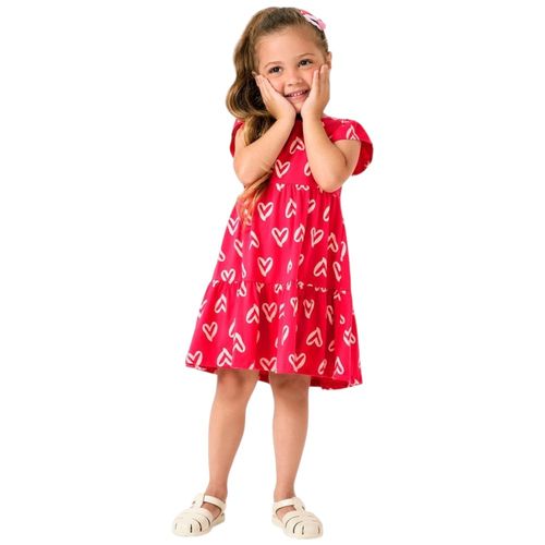 Vestido rosado con estampado de corazones para niña