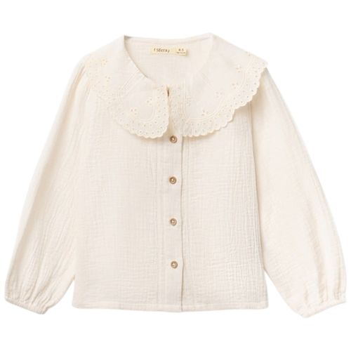 Blusa beige bordada para niña