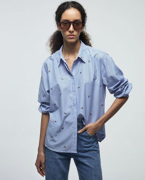 Blusa Sfera camisera rayada manga larga para mujer