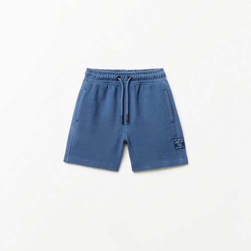 Short azul liso para niño