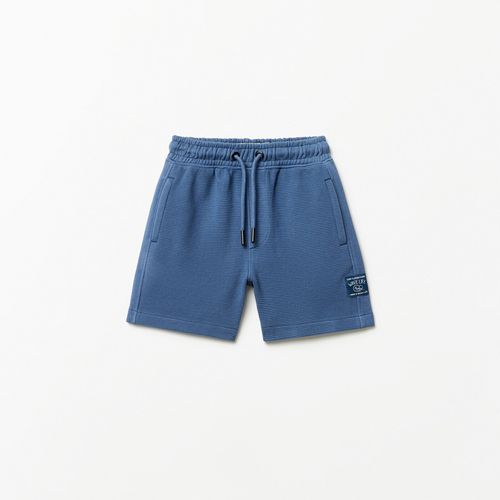 Short azul liso para niño
