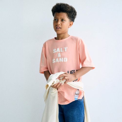 Camiseta anaranjada estampada para niño