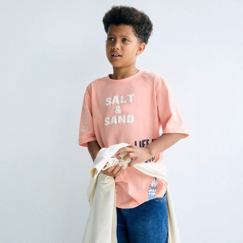 Camiseta anaranjada estampada para niño