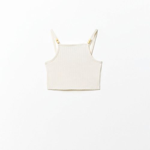 Blusa beige acanalada para niña