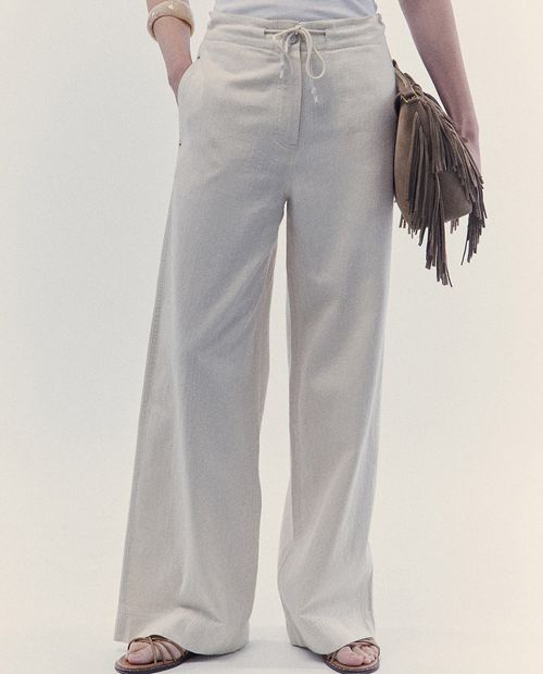 Pantalón Sfera pull on beige de cintura alta para mujer