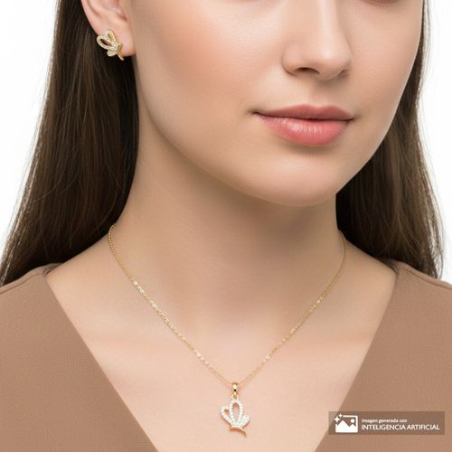 Set de aretes y cadena con dije de mariposa con zirconia de plata en baño de oro para mujer