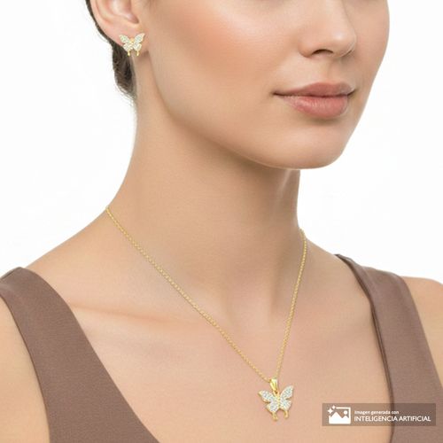 Set de aretes y cadena con dije de mariposa con zirconia de plata en baño de oro para mujer