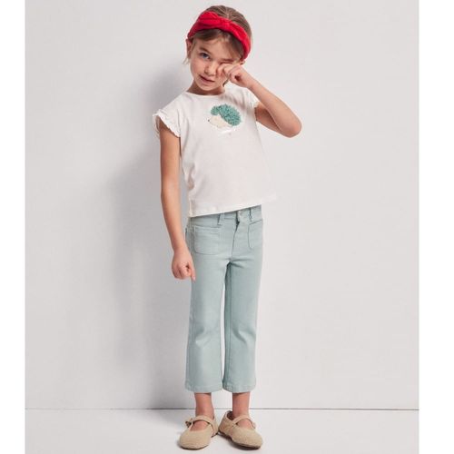 Camiseta blanca con textura para bebé niña