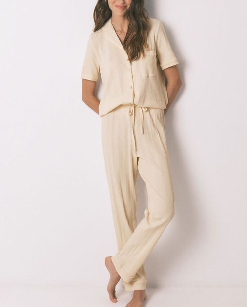 Pijama con pantalón Women Secret amarilla con textura para mujer
