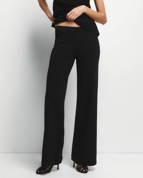 Pantalón Sfera pull on negro sólido para mujer
