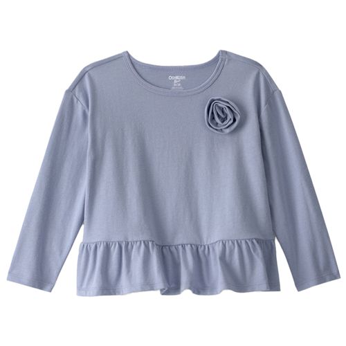 Blusa azul con aplique floral y olan en la cintura para niña