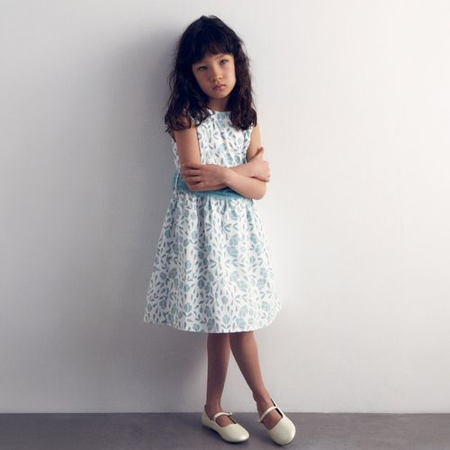 Vestido blanco con estampado para niña